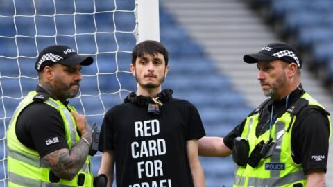 Scotland vs Israel Euro 2025 qualifier delayed after protester chains himself to the goalpost.